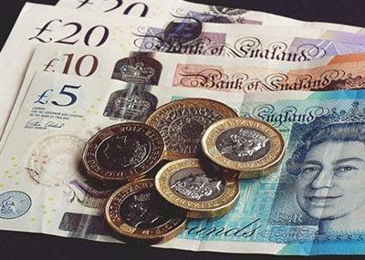 Great British Pound notes and coins.