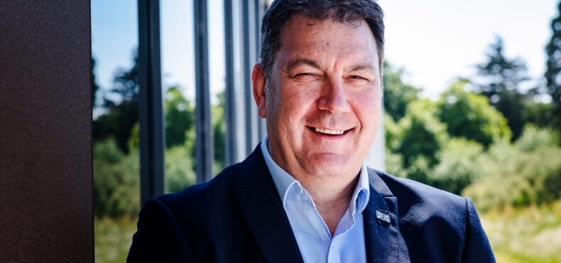 Steve Turner smiling outside of Cleveland Central HQ