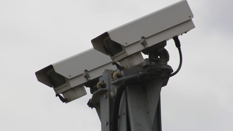 Two CCTV cameras pointing downwards